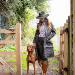 Pet Care Dog walking with owner on an overcast day. Dog Walking Melbourne: 7 Winter Safety Tips Every Local Pet Owner Should Know